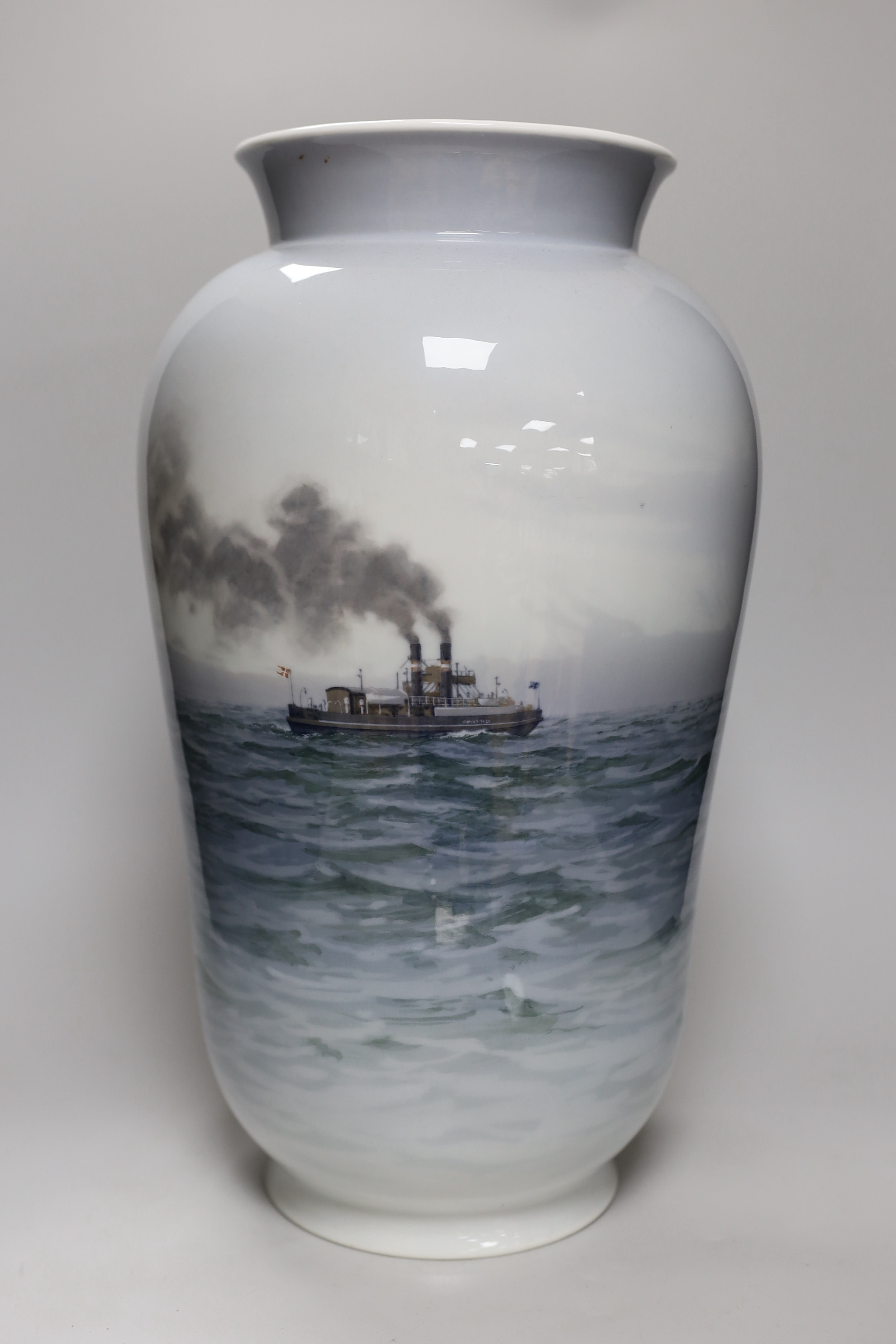 A large Royal Copenhagen vase with shipping scene, painted by Theodor Kjølner and dated 1938, height 44.5cm